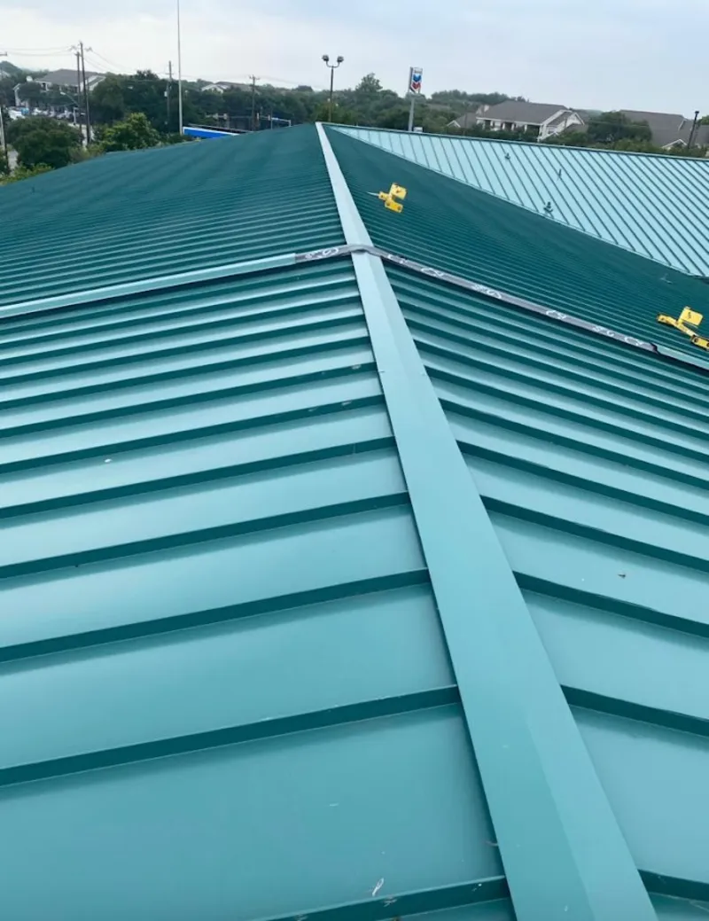 Green commercial metal roof ridge and valley for Metal Roof Repair in Valrico